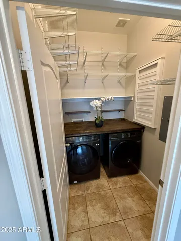 a kitchen with stainless steel appliances granite countertop a sink and stove