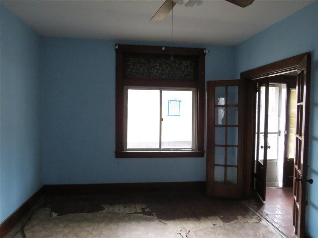 407 Linnview Avenue Pittsburgh, PA 15210 - Photo 33 of 38 an empty room with a empty space and windows
