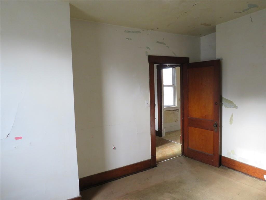 407 Linnview Avenue Pittsburgh, PA 15210 - Photo 4 of 38 an empty room with windows