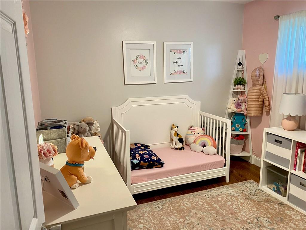 2399 Ridge Road Monaca, PA 15061 - Photo 11 of 20 a bedroom with a bed and a window