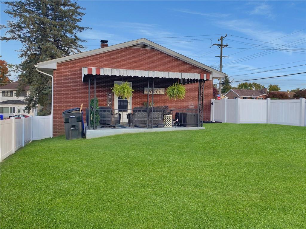 2399 Ridge Road Monaca, PA 15061 - Photo 17 of 20 a front view of house with yard
