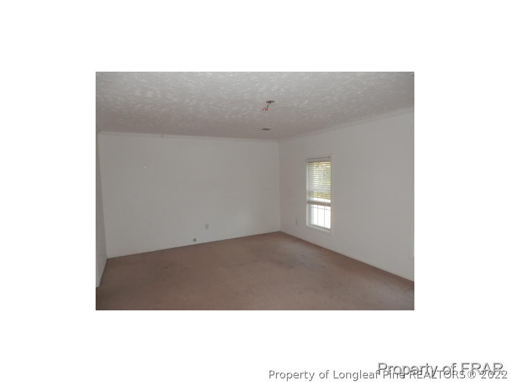 248 St Matthews Church Road Raeford, NC 28376 - Photo 7 of 14 a open area with window