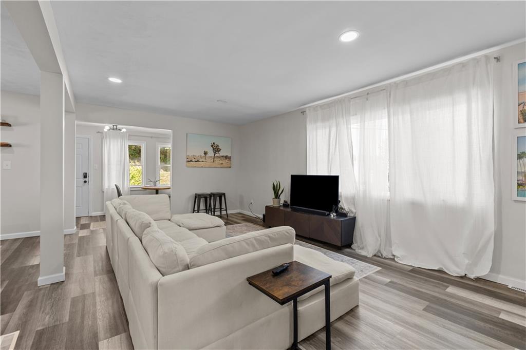 5575 Aiken Road McKees Rocks, PA 15136 - Photo 5 of 33 a living room with furniture and a flat screen tv