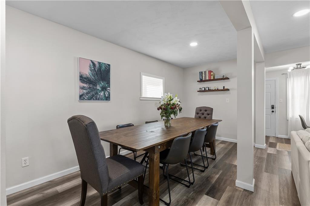 5575 Aiken Road McKees Rocks, PA 15136 - Photo 8 of 33 a view of a dining room with furniture and wooden floor