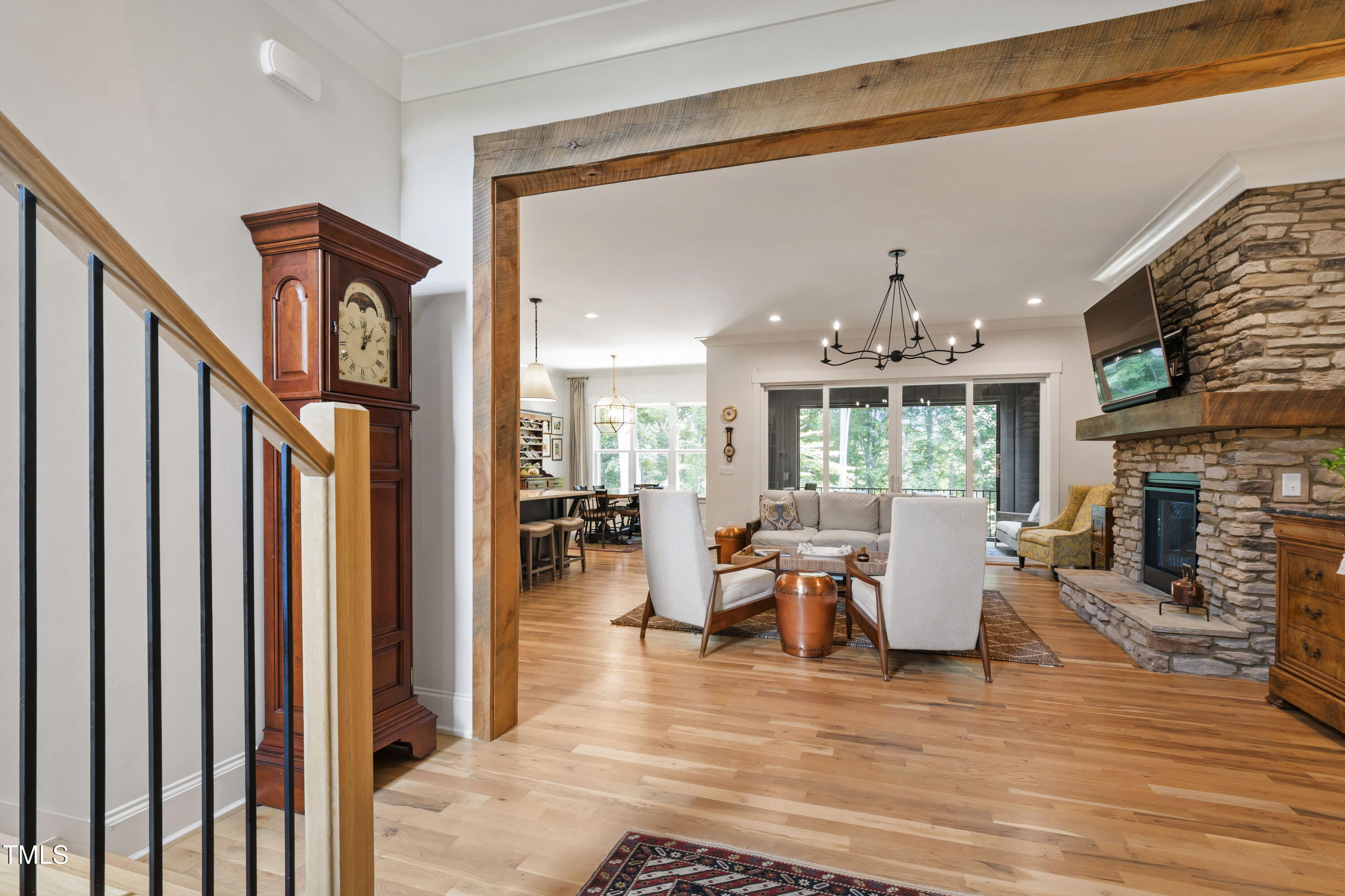 541 Sunset Grove Drive Pittsboro, NC 27312 - Photo 12 of 75 a view of a dining room with furniture window and wooden floor