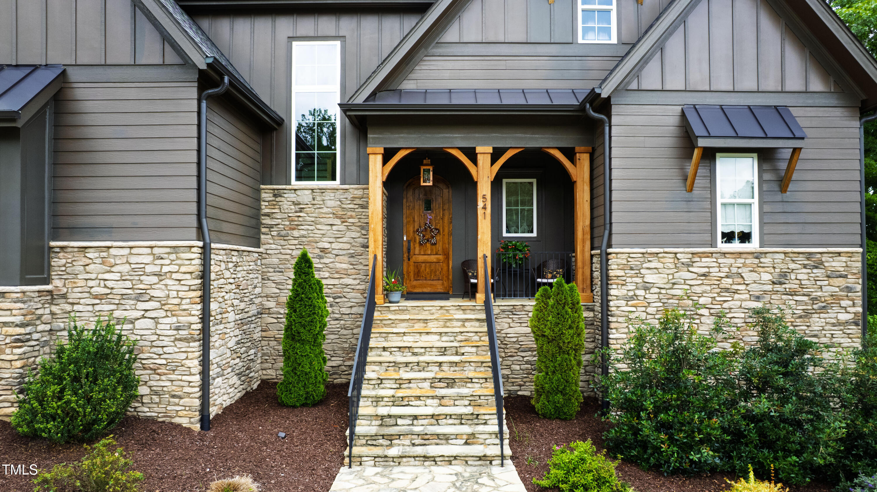 541 Sunset Grove Drive Pittsboro, NC 27312 - Photo 2 of 75 a view of a wooden door of the house