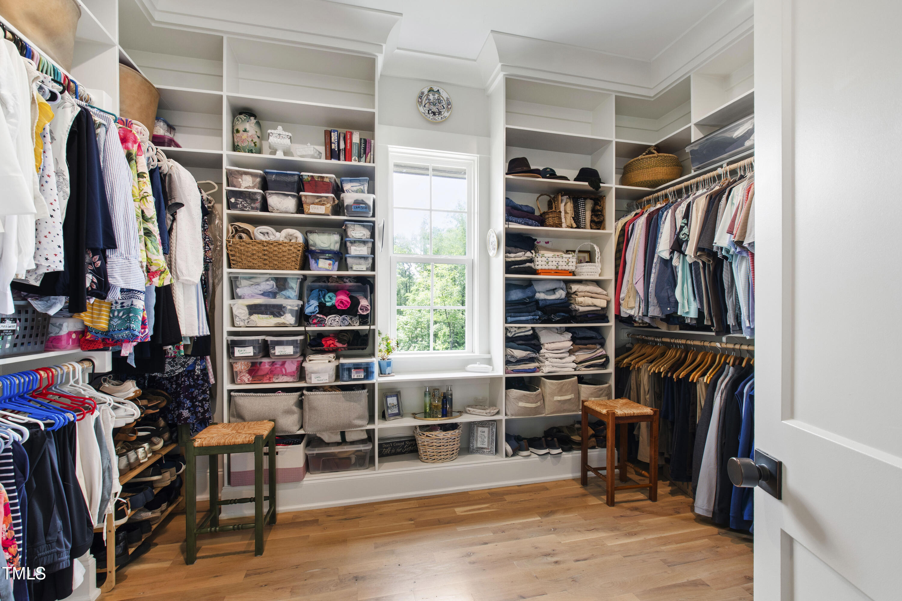 541 Sunset Grove Drive Pittsboro, NC 27312 - Photo 30 of 75 a view of walk in closet with clothes and shoes