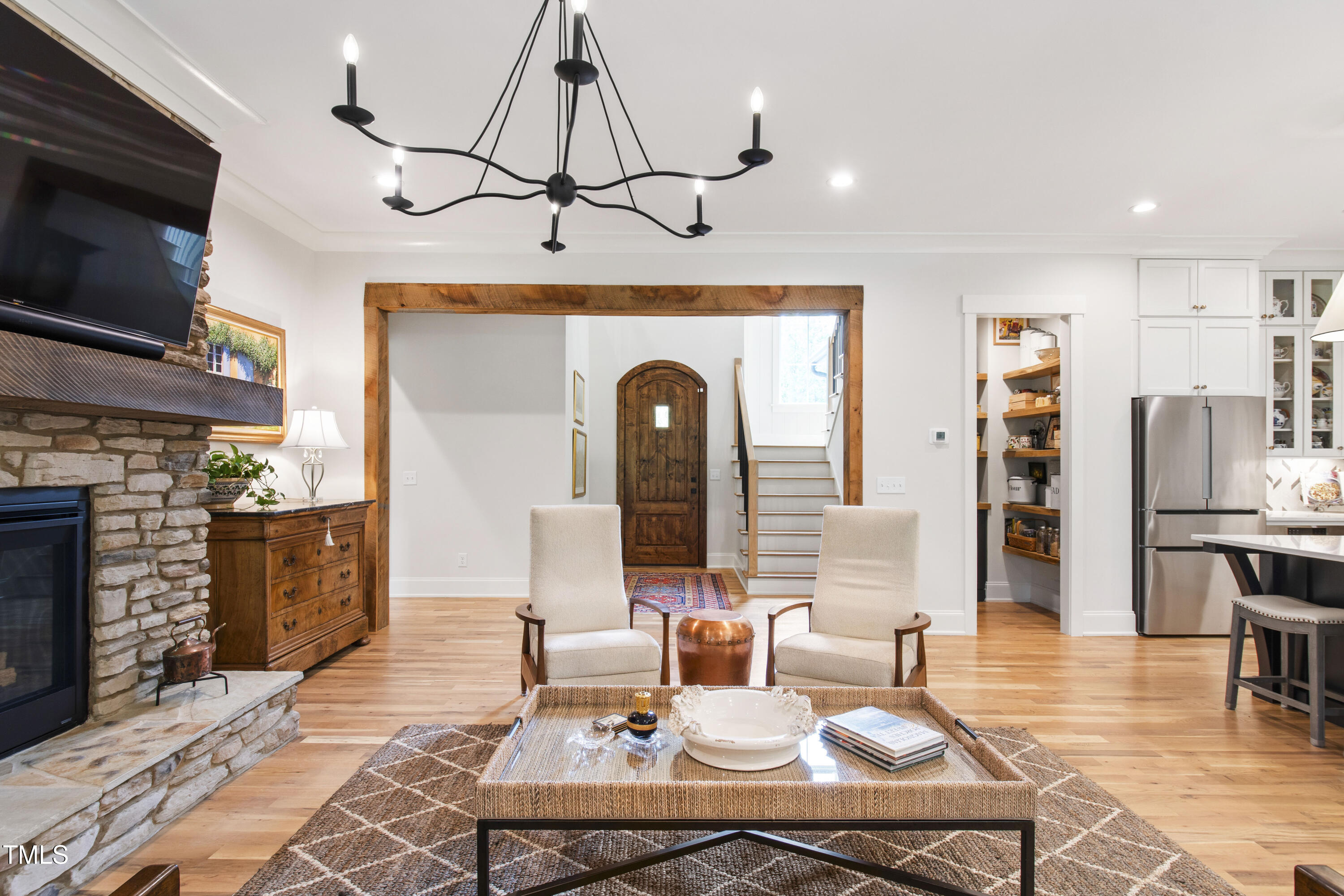 541 Sunset Grove Drive Pittsboro, NC 27312 - Photo 36 of 75 a living room with fireplace furniture and a flat screen tv