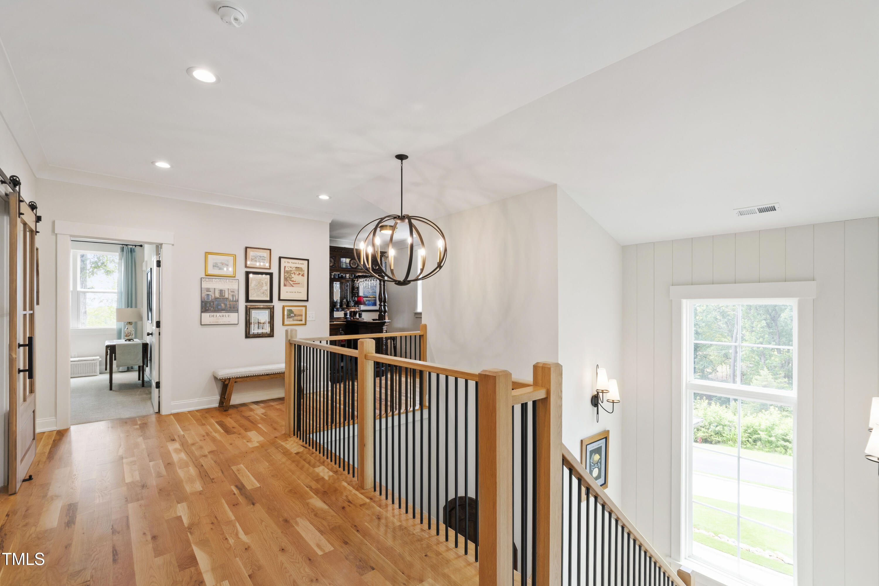 541 Sunset Grove Drive Pittsboro, NC 27312 - Photo 38 of 75 a view of a living room and kitchen with wooden floor