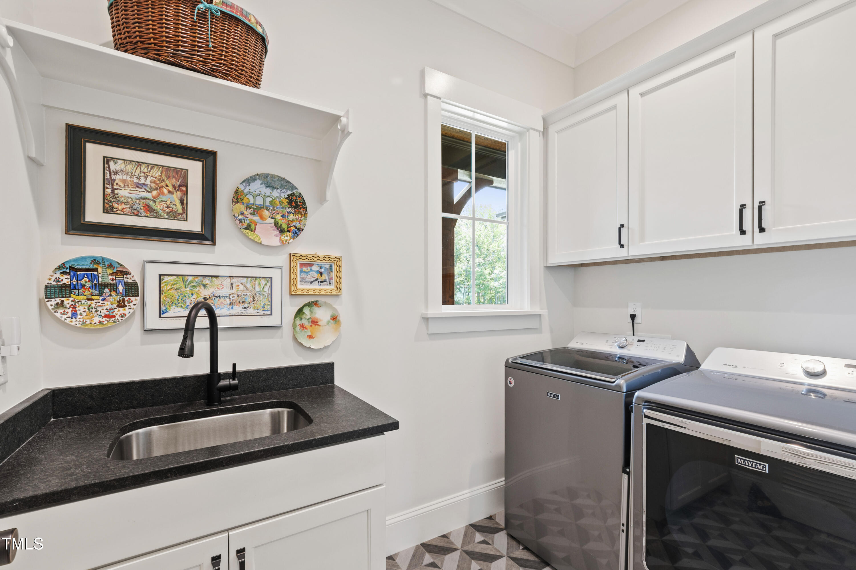 541 Sunset Grove Drive Pittsboro, NC 27312 - Photo 40 of 75 a sink with a cabinet and a window
