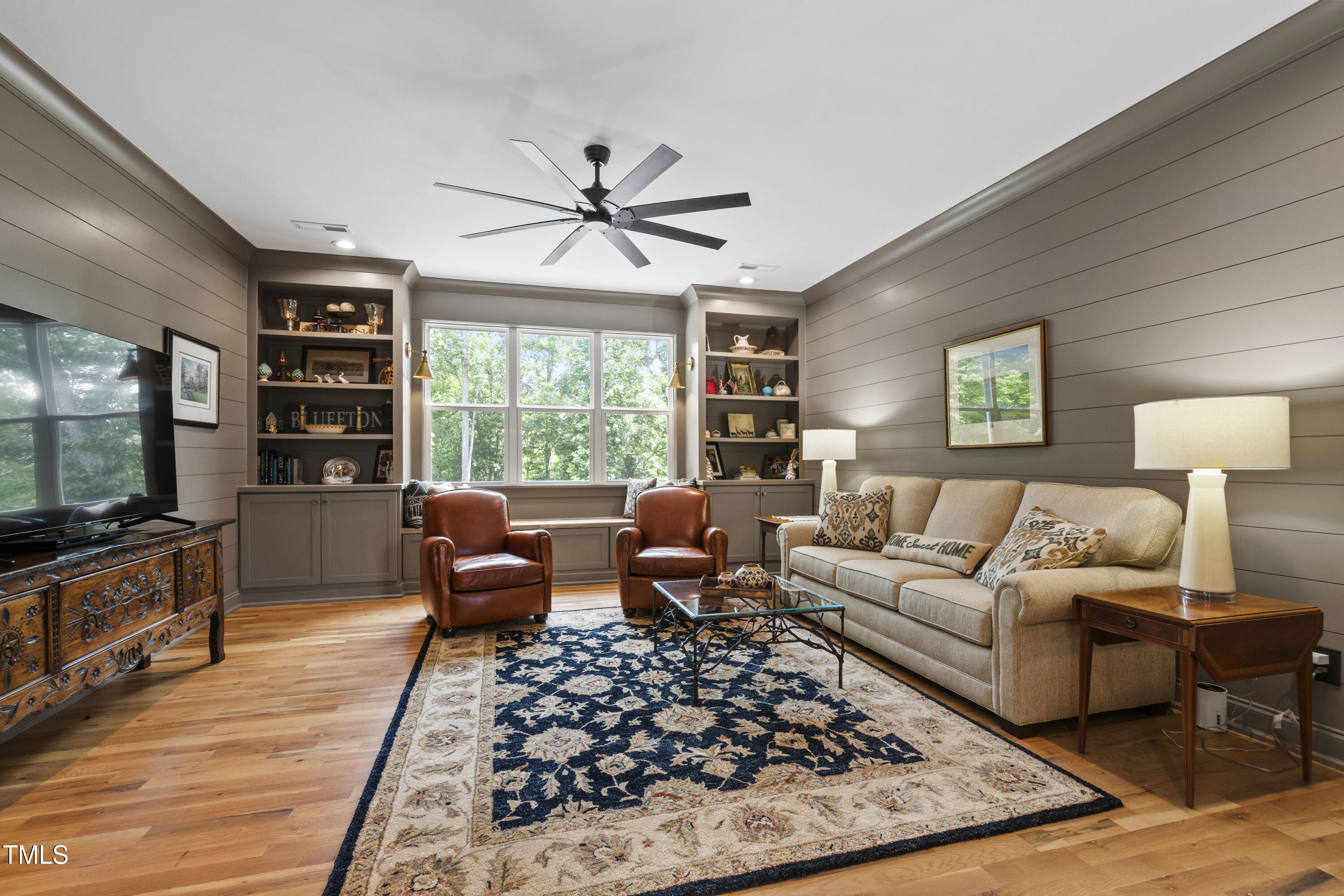 541 Sunset Grove Drive Pittsboro, NC 27312 - Photo 43 of 75 a living room with furniture and a flat screen tv