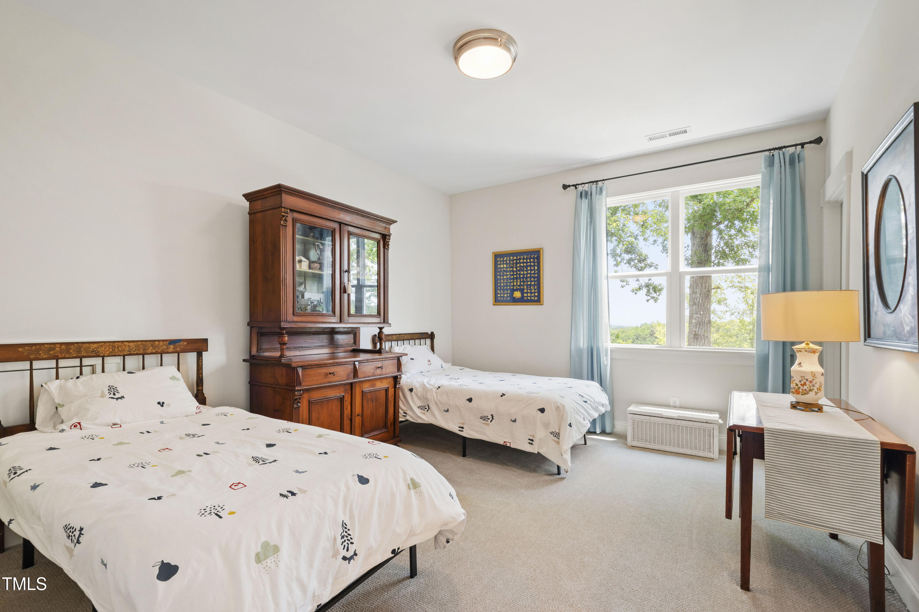 541 Sunset Grove Drive Pittsboro, NC 27312 - Photo 49 of 75 a bedroom with two beds and a window