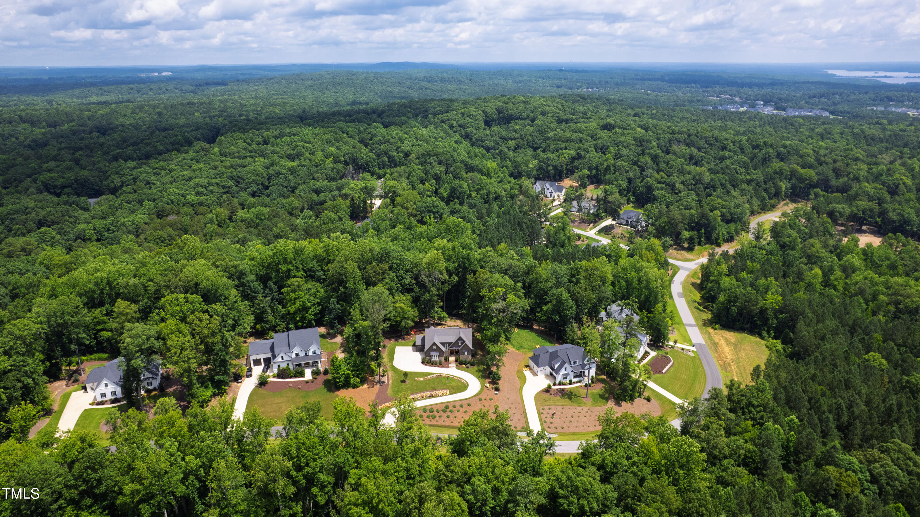 541 Sunset Grove Drive Pittsboro, NC 27312 - Photo 71 of 75 an aerial view of a house with a yard