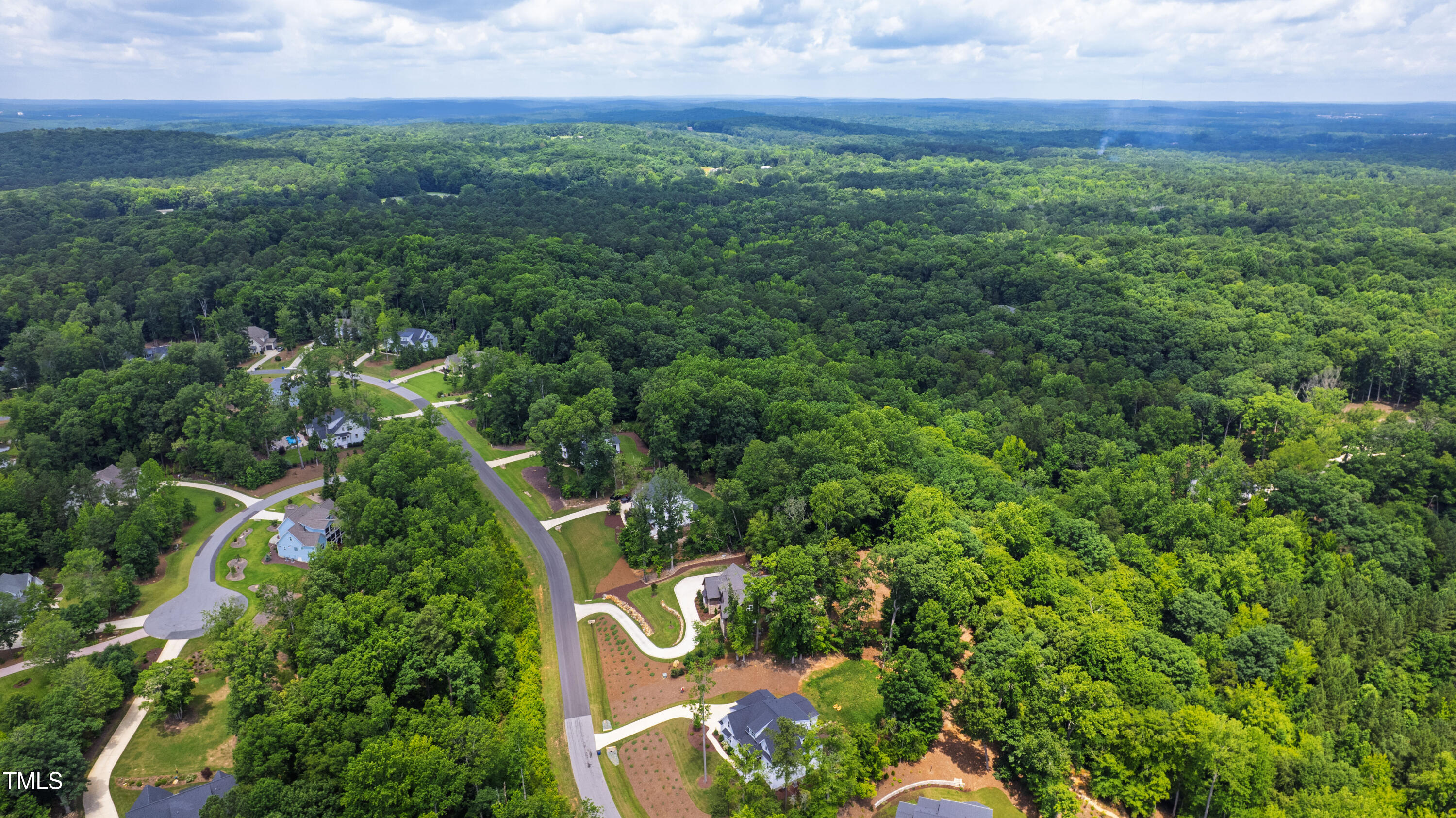541 Sunset Grove Drive Pittsboro, NC 27312 - Photo 72 of 75 an aerial view of residential house with outdoor space and trees all around