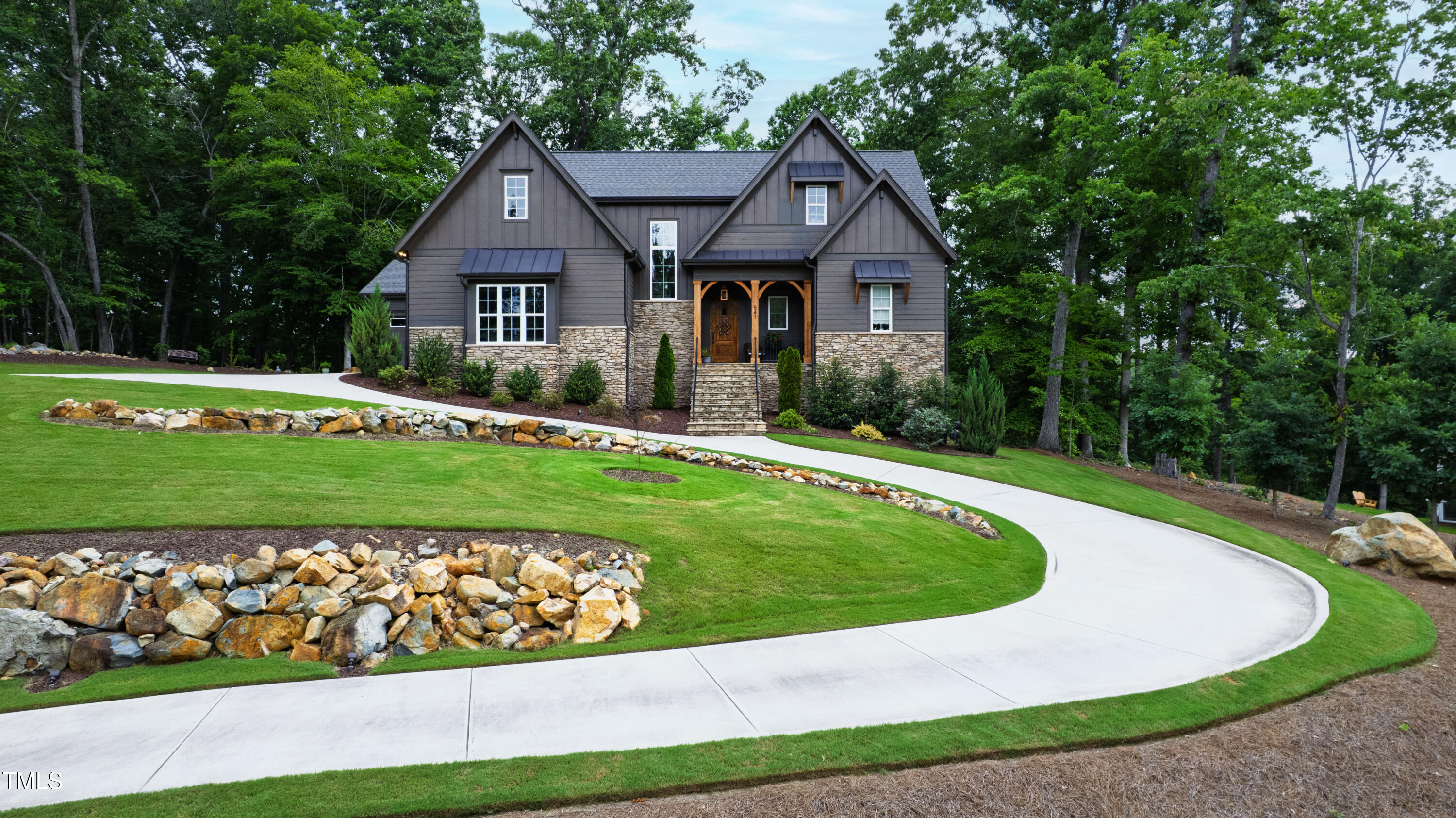 541 Sunset Grove Drive Pittsboro, NC 27312 - Photo 73 of 75 a front view of a house with a yard