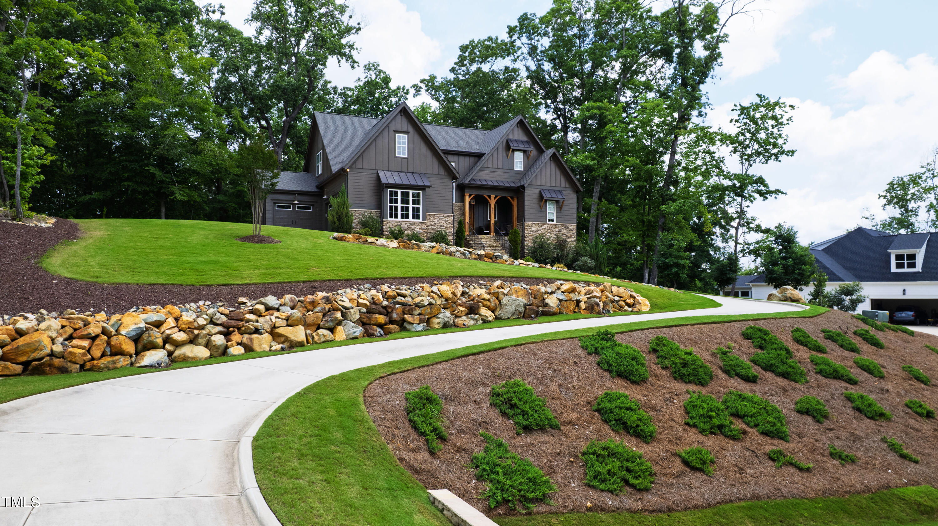 541 Sunset Grove Drive Pittsboro, NC 27312 - Photo 74 of 75 a front view of a house with a yard