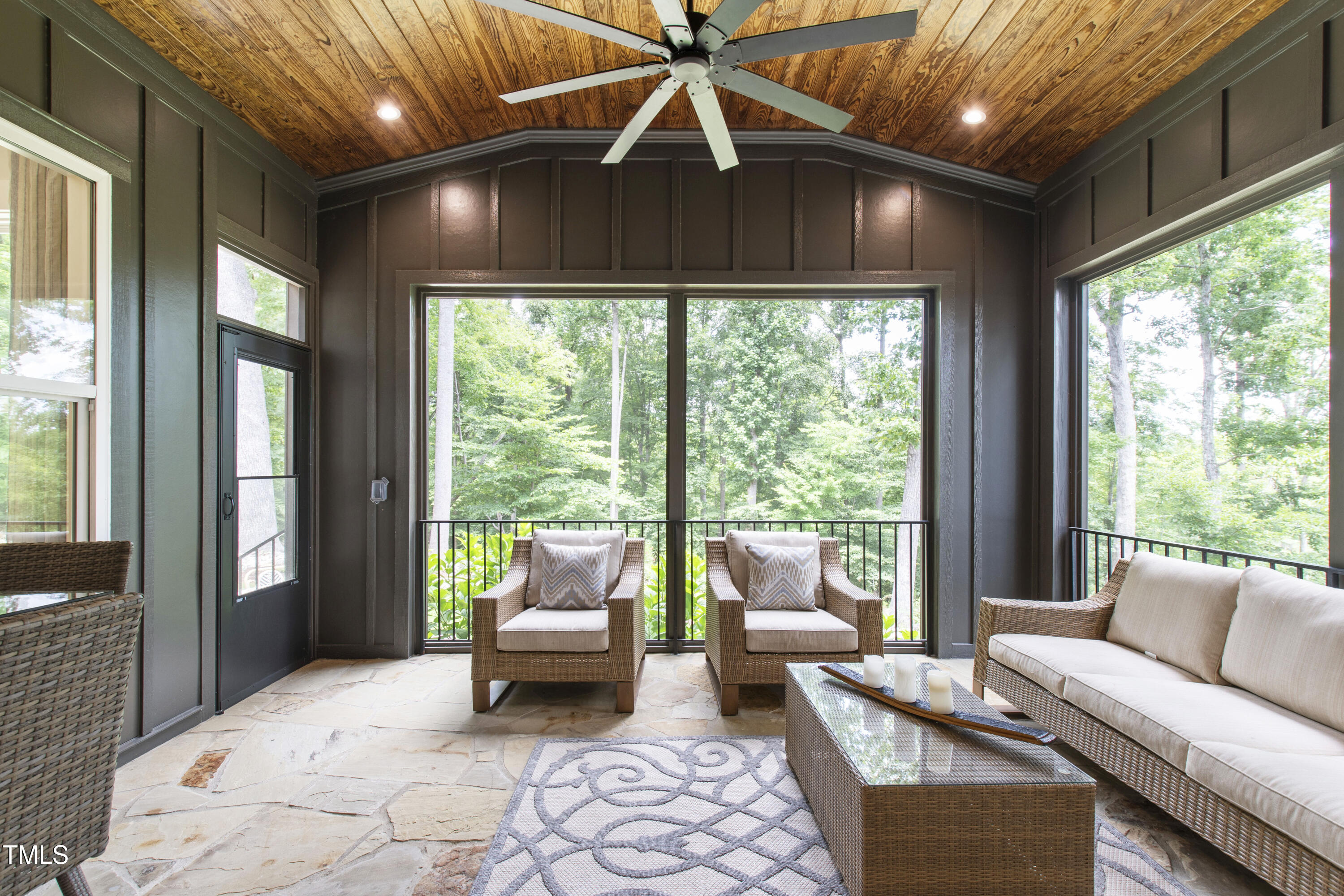541 Sunset Grove Drive Pittsboro, NC 27312 - Photo 7 of 75 a living room with furniture and a floor to ceiling window