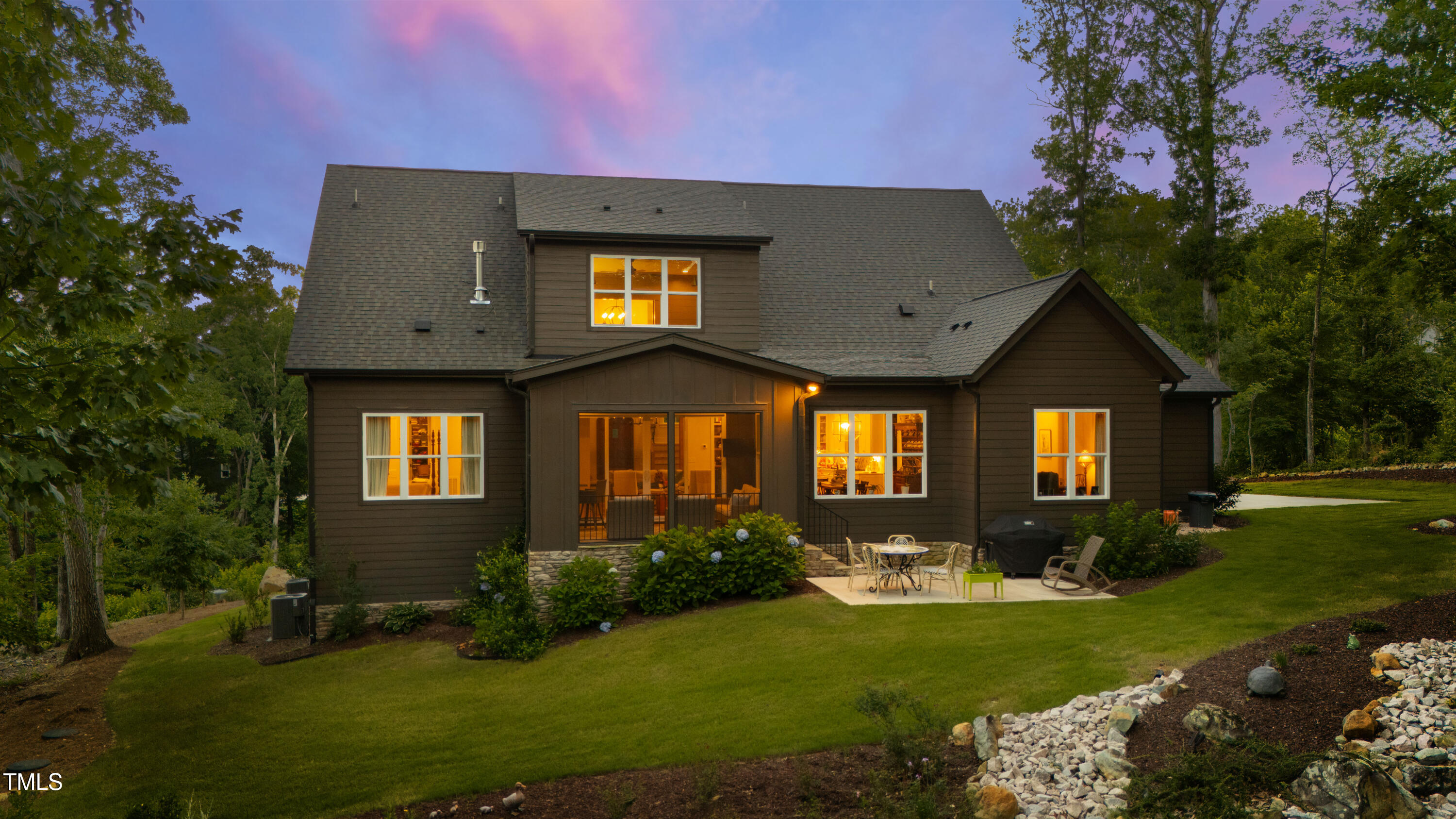 541 Sunset Grove Drive Pittsboro, NC 27312 - Photo 9 of 75 a front view of a house with a yard