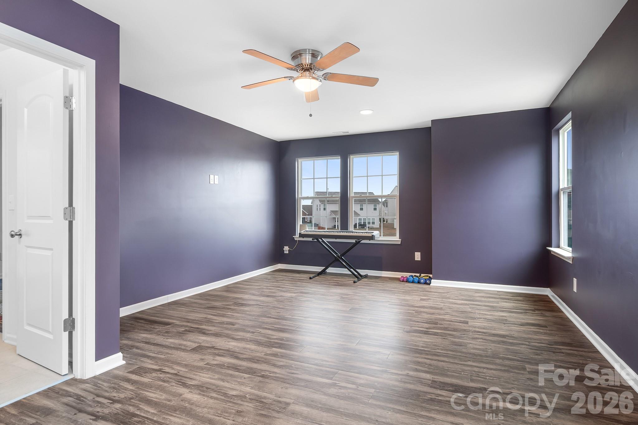 6308 Durango Way Denver, NC 28037 - Photo 18 of 45 a view of an empty room with a window