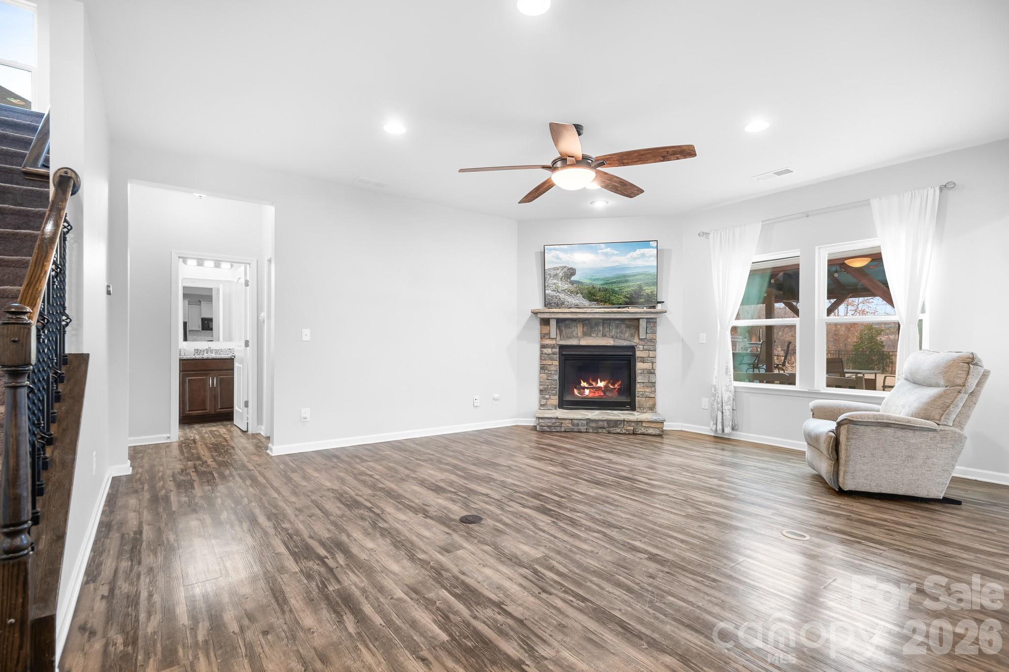 6308 Durango Way Denver, NC 28037 - Photo 6 of 45 a living room with furniture and a fireplace