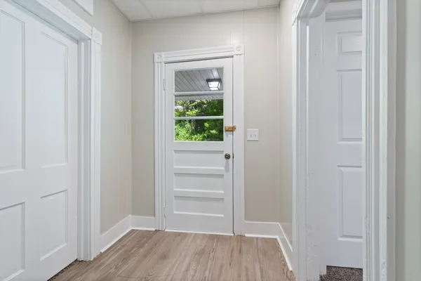 a view of an empty room with a window
