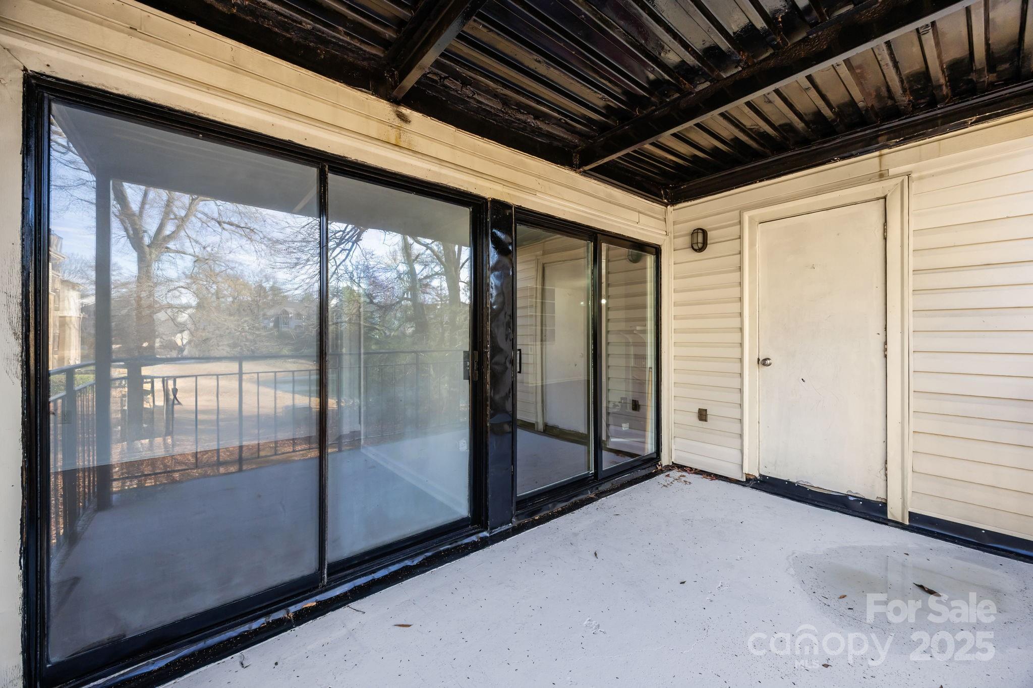 4902 Spring Lake Drive, Unit D Charlotte, NC 28212 - Photo 24 of 30 a view of a porch