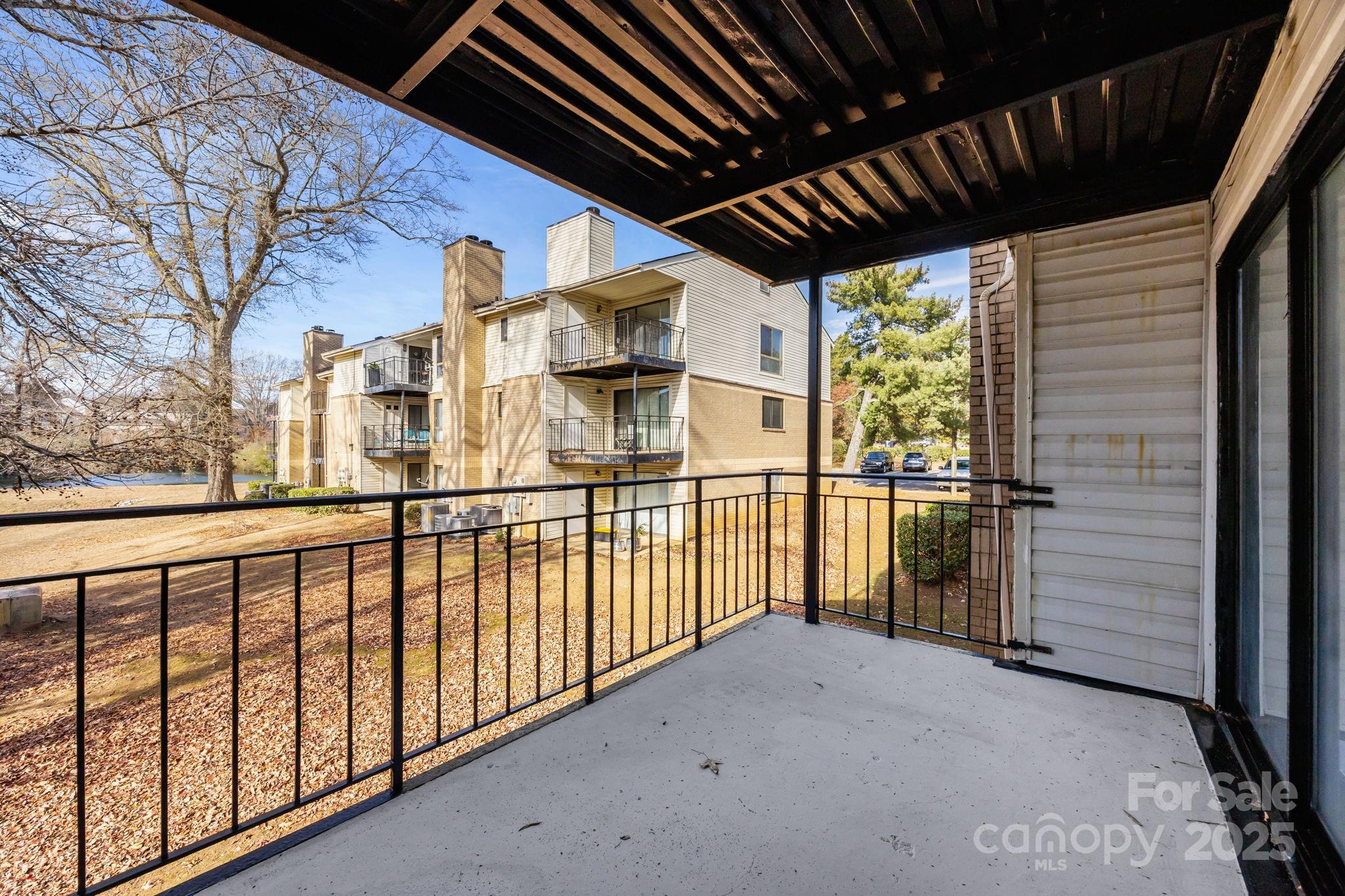 4902 Spring Lake Drive, Unit D Charlotte, NC 28212 - Photo 25 of 30 a view of a porch