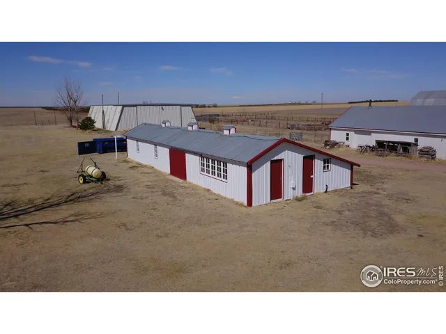 a view of parking garage with cars