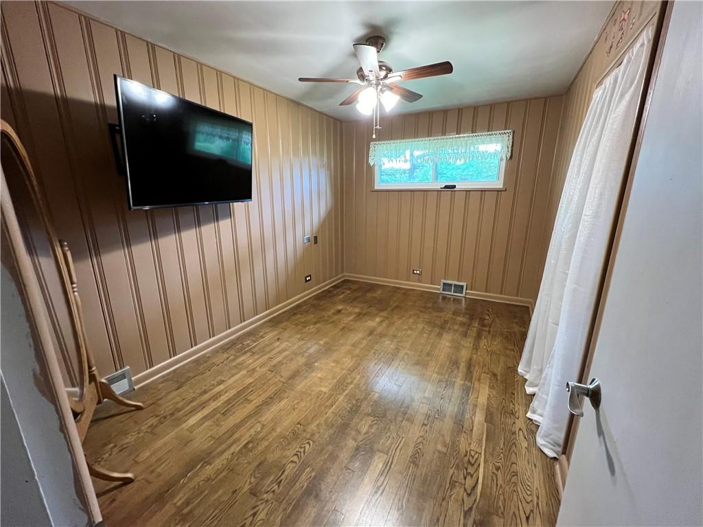 100 Randy Drive Butler, PA 16002 - Photo 12 of 25 a view of a livingroom with a flat screen tv
