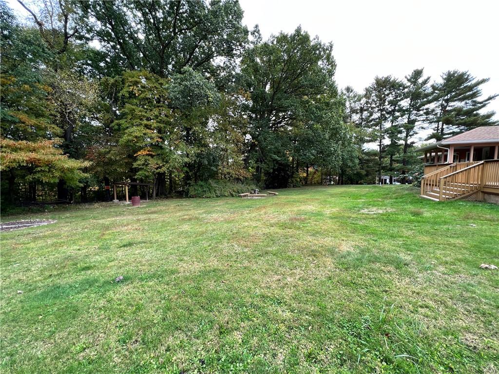100 Randy Drive Butler, PA 16002 - Photo 23 of 25 a view of a green yard with a house and large trees