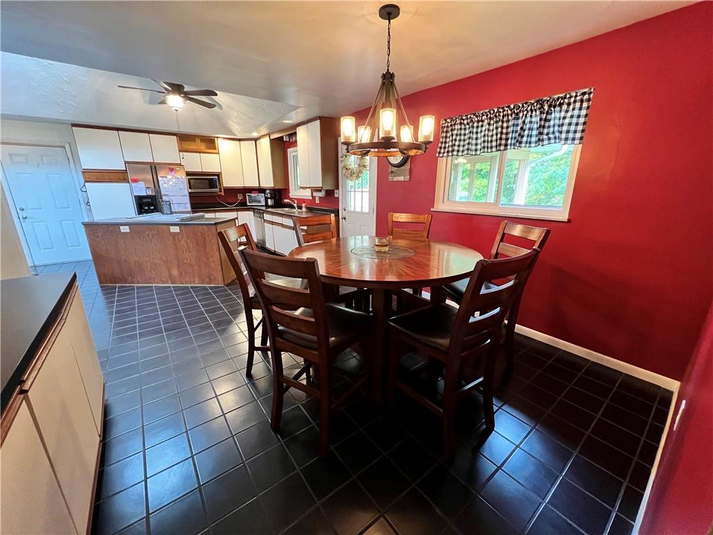 100 Randy Drive Butler, PA 16002 - Photo 5 of 25 a view of a dining room with furniture