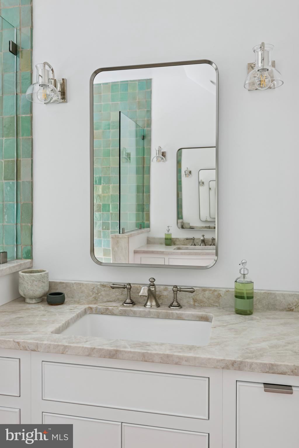 2320 Turk Road Doylestown, PA 18901 - Photo 16 of 35 a bathroom with a sink and a mirror