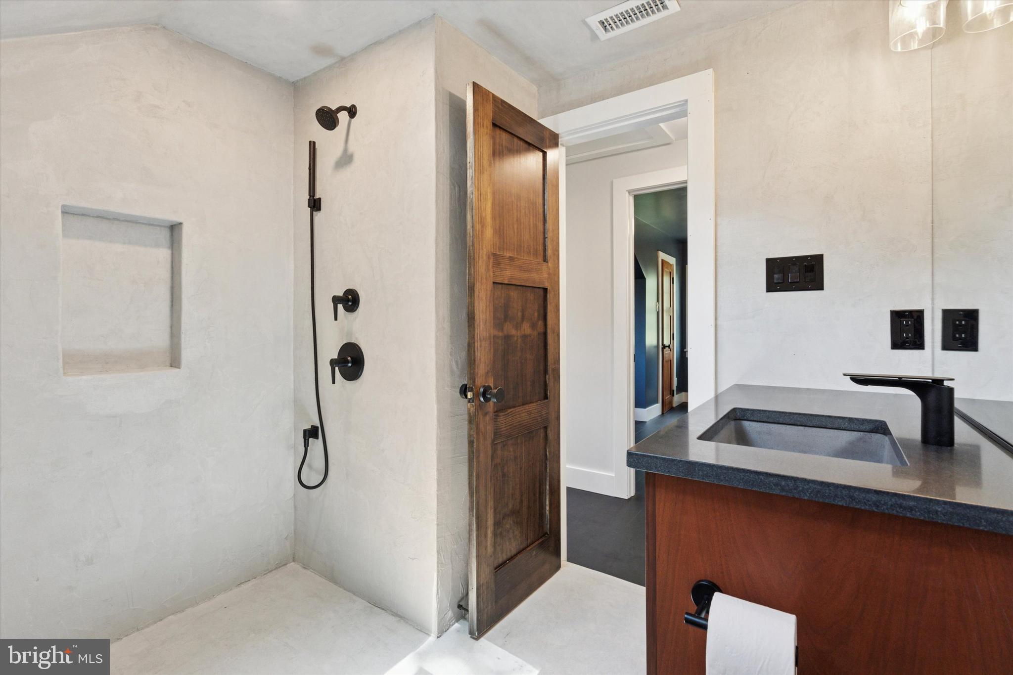 2320 Turk Road Doylestown, PA 18901 - Photo 31 of 35 a bathroom with a sink a toilet and shower