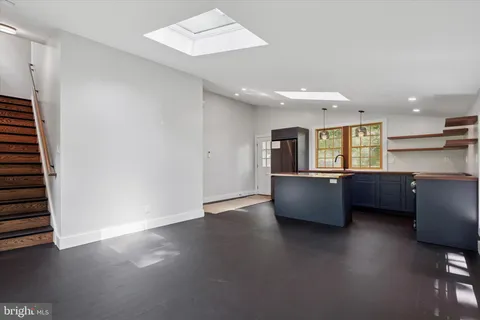 a living room with furniture and window