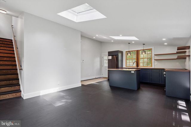 a living room with furniture and window