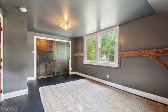 a view of a livingroom with a staircase
