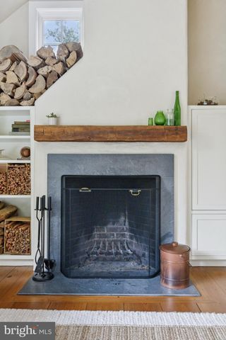 a fireplace with a clock on top of it