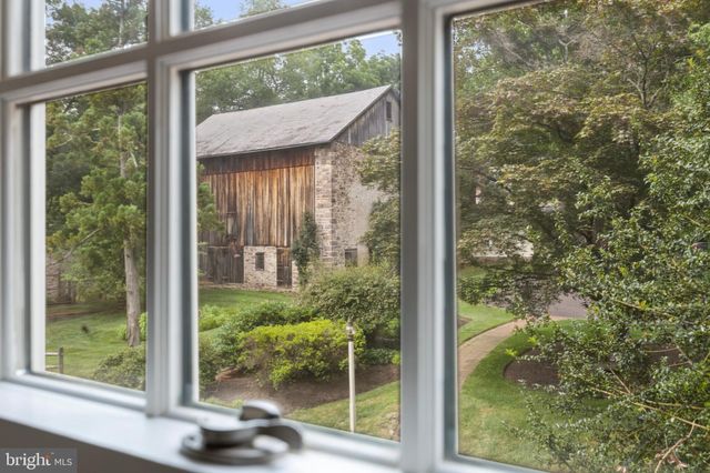 a view of a glass door and porch