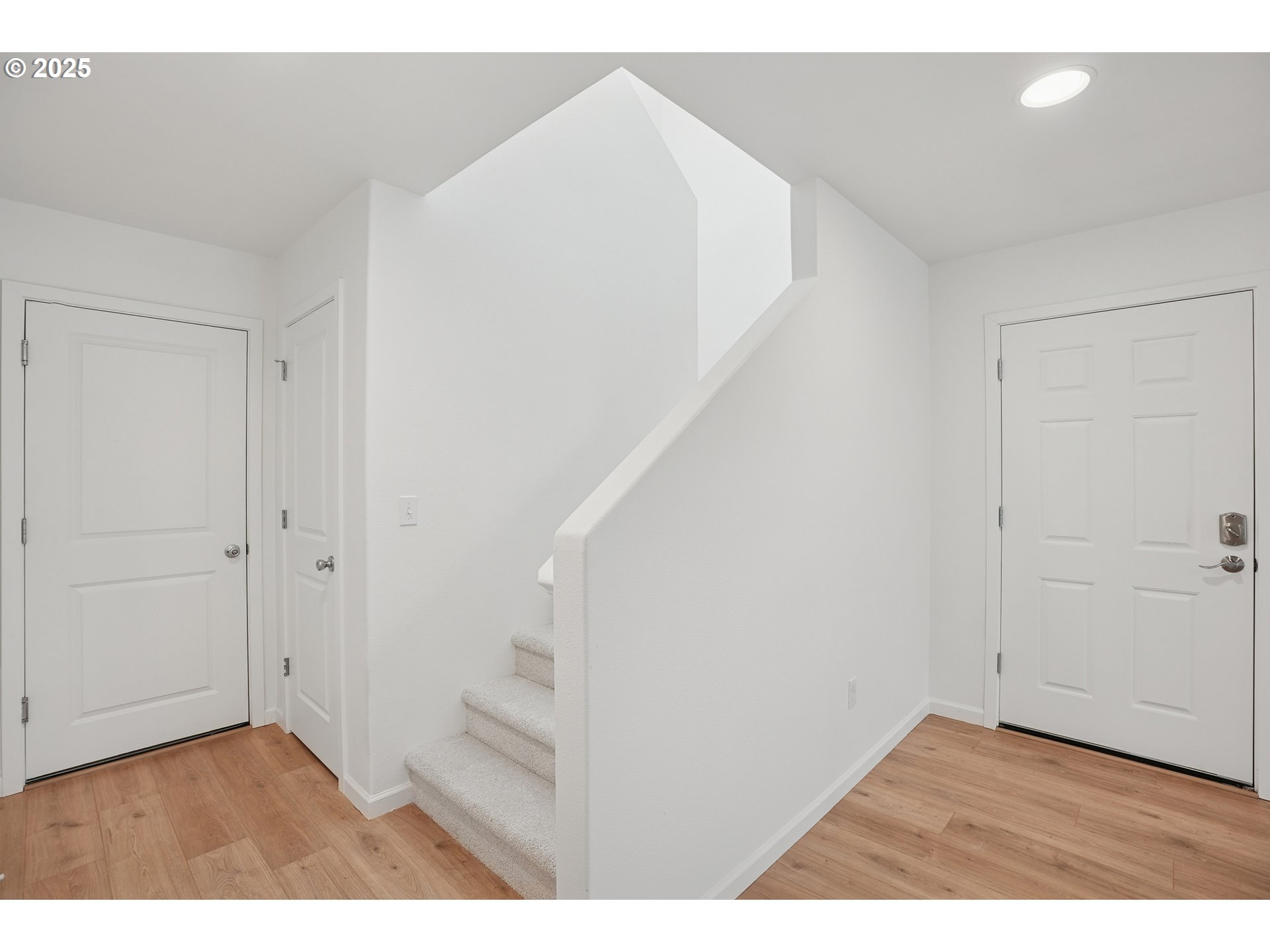 1014 South View Drive Molalla, OR 97038 - Photo 10 of 19 a view of an empty room with stairs and a hallway
