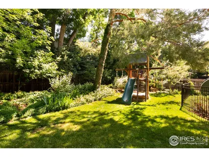 a view of yard with swimming pool