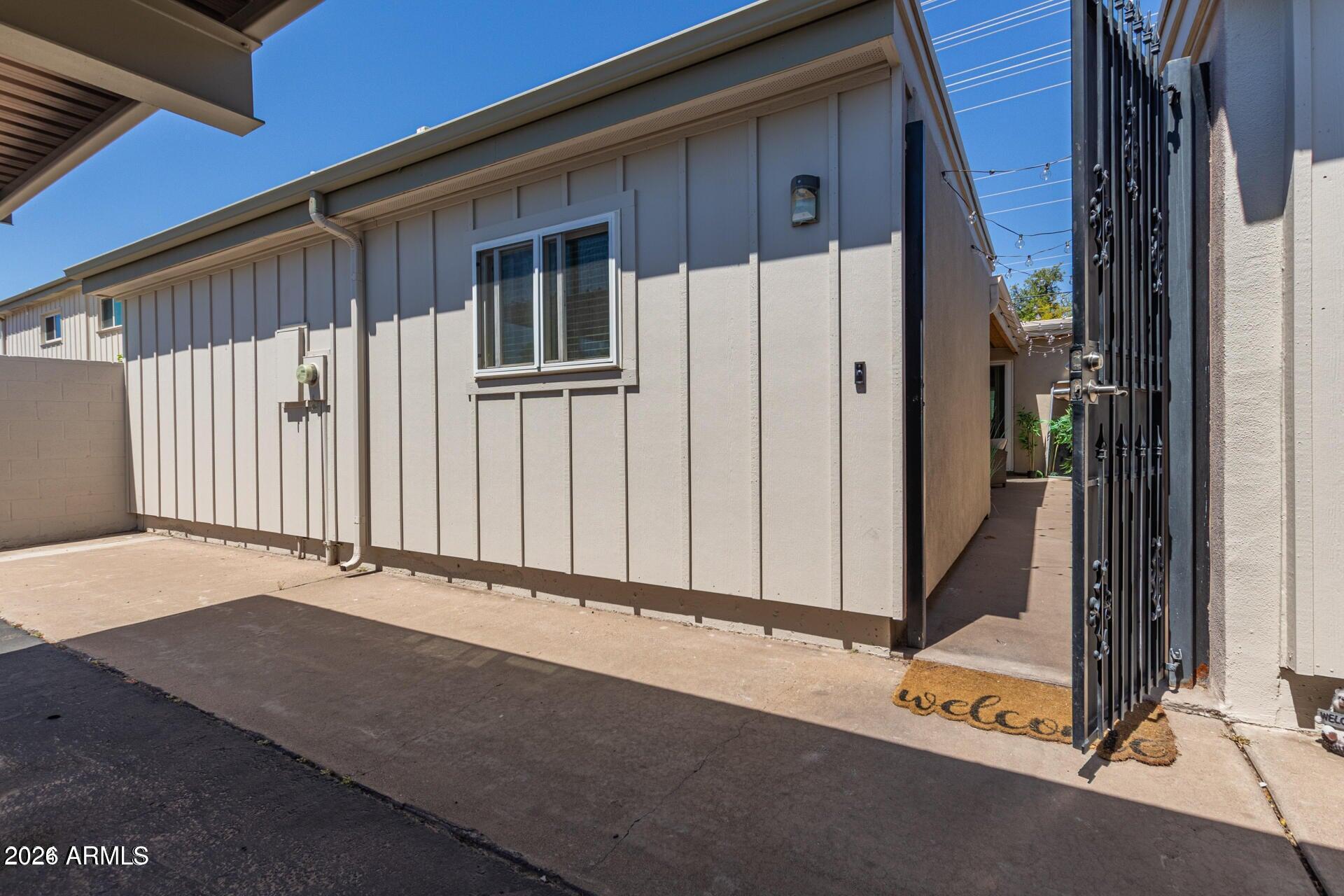 5913 East Thomas Road Scottsdale, AZ 85251 - Photo 24 of 26 a view of a house with a garage