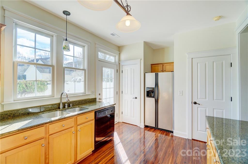 292 Elis Way Fort Mill, SC 29708 - Photo 13 of 22 a kitchen with granite countertop a sink and a window
