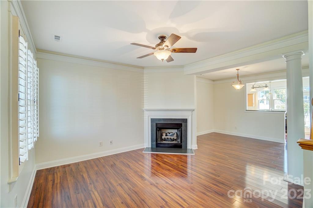 292 Elis Way Fort Mill, SC 29708 - Photo 5 of 22 a view of empty room with wooden floor and fan