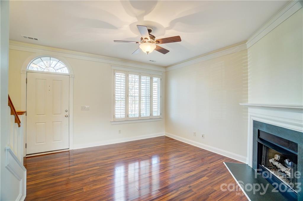 292 Elis Way Fort Mill, SC 29708 - Photo 6 of 22 wooden floor in an empty room with a window
