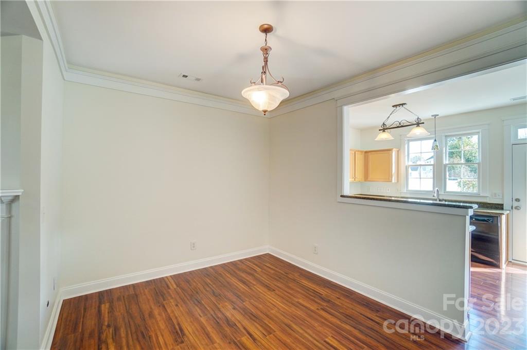 292 Elis Way Fort Mill, SC 29708 - Photo 8 of 22 a view of empty room with wooden floor and fan