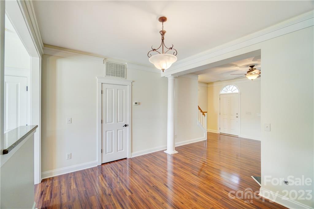 292 Elis Way Fort Mill, SC 29708 - Photo 9 of 22 a view of an empty room with wooden floor and a window