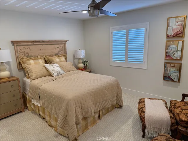 a bedroom with bed and a window