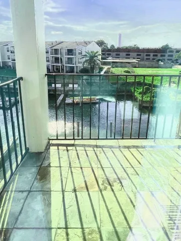 a view of swimming pool with outdoor space and seating area
