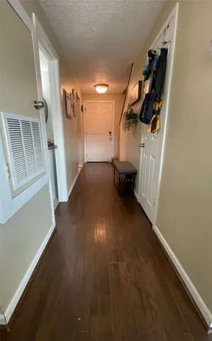 a bedroom with a bed and a fireplace