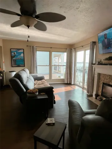 a view of kitchen with cabinets and wooden floor